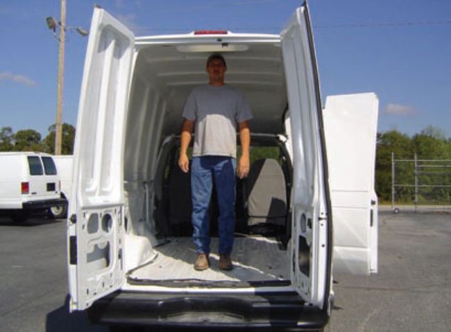 Vision Manufacturing’s HCV van features a complete van chassis instead of a cutaway, incorporating the factory door hardware and electronics. The walk-thru interior has six feet of headroom and can be configured with a variety of rack and bin packages already available to end users. -